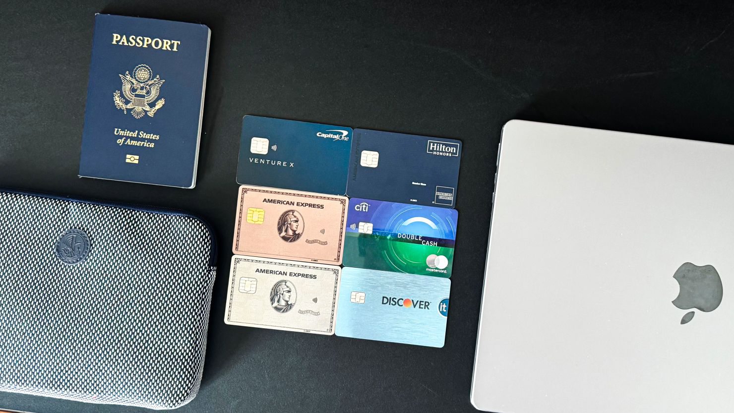 Credit cards arranged on travel accessories